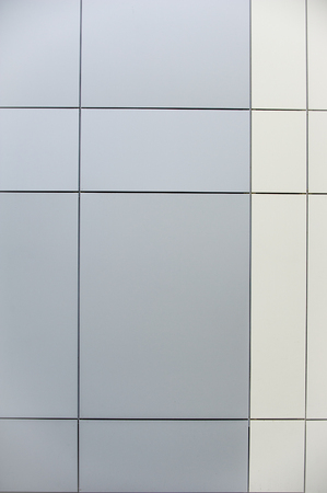 Texture, pattern, background. Panels of color in decoration of buildings