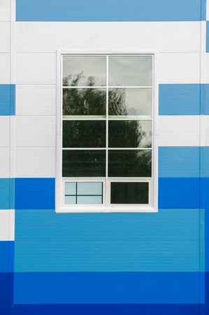 Texture, background. white blue panel. a flat or curved component, typically rectangular, that forms or is set into the surface of a door, wall, or ceiling.の写真素材