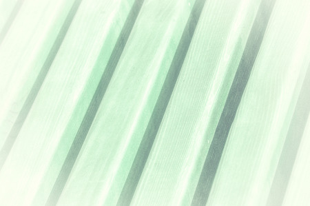 Texture, pattern, background. Wooden slats. Fence from a tree. a barrier, railing, or other upright structure, typically of wood, enclosing an area of ground to mark a boundary,の写真素材