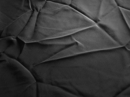 Fabric texture.   tissue, textile, cloth,  material, woven. Photos shot in studio. cloth, typically produced by weaving or knitting textile fibers.の写真素材