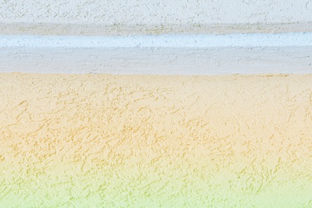 Texture, pattern, background. plaster on the wall. a soft mixture of lime with sand or cement and water for spreading on walls, ceilings, or other structuresの写真素材