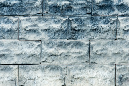 Texture, background. decorative brick, building decoration. a small rectangular block typically made...