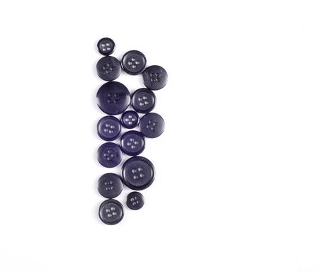 sewing buttons collection. Various sewing buttons with a thread. isolated.  collection of various...