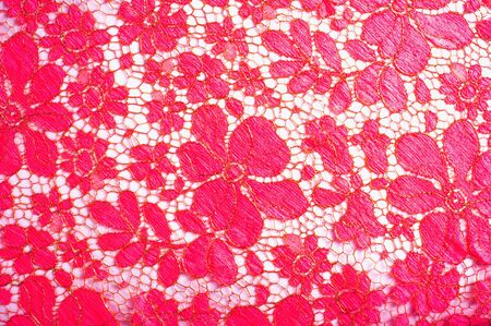 texture lace. a fine open fabric, typically one of cotton or silk, made by looping, twisting, or knitting thread in patterns and used especially for trimming garments.の写真素材