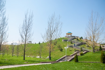 Kazakhstan, early spring. Park of the first president of the country. Central park at sunny day....