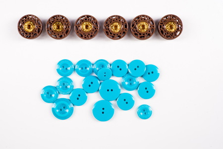 sewing buttons collection. Various sewing buttons with a thread. isolated.  collection of various...