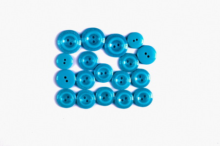 sewing buttons collection. Various sewing buttons with a thread. isolated.  collection of various sewing button on white background.の写真素材