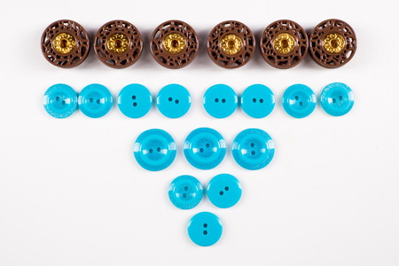 sewing buttons collection. Various sewing buttons with a thread. isolated.  collection of various...