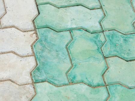 tile texture stones Square. Stone paving texture. Abstract structured background. Brick pavement. Brick worm on the walkwayの写真素材