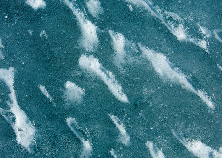 Frozen lake in the spring. spring iceの写真素材