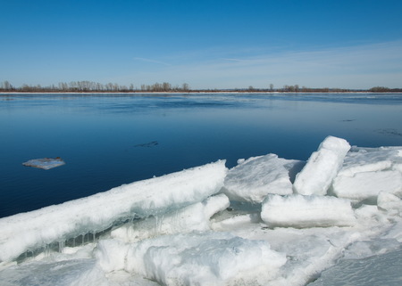Spring flooding, ice water, Early spring on the river. Russia Tatarstan Kama river in early springの写真素材