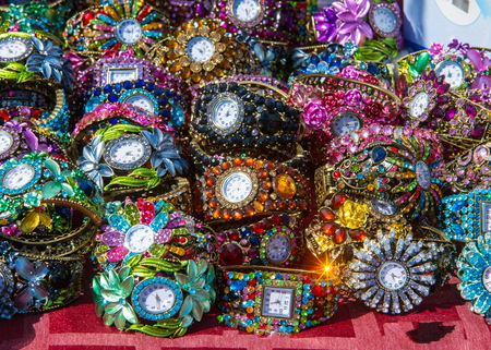 bracelet watch decorated with colored stonesの写真素材