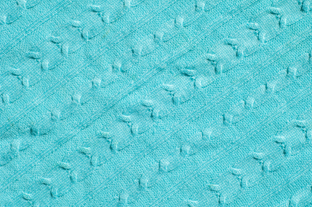 Texture, background, pattern. Women's woolen blue striped sweater