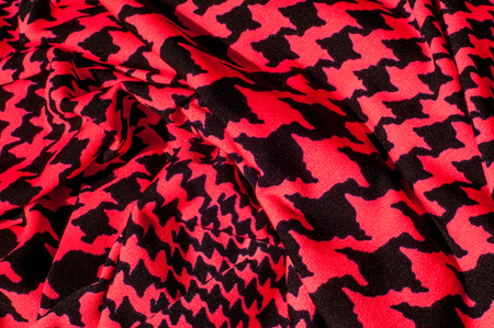 Texture, background, pattern. Dress of silk fabric, Abstract drawing of red background, black...