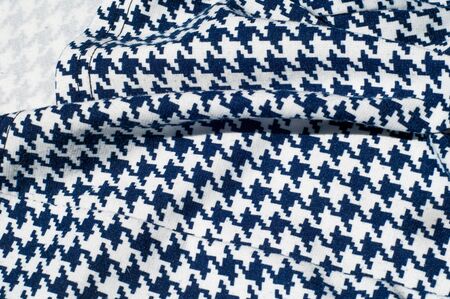 Texture, fabric, background. Fabric crochet pattern blue diamond pattern on white backgroundの写真素材