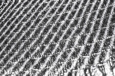 Texture, background, pattern. Women's scarf, striped fabric Black white lines intertwinedの写真素材