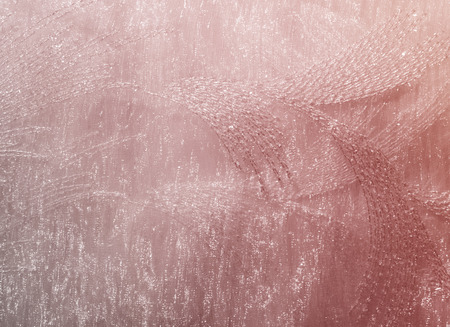 Texture, background, pattern. Tulle of pastel pink tones. Abstract background of pink fabric. Soft texture of the fabric, pink pastel tone. Shabby chic style. Crumpled tulle as a background.の写真素材