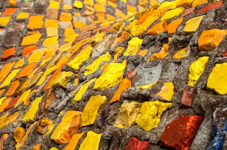 Texture, background, pattern. Closeup photo of multi-colored mosaic stones. Structure design decor. Swimming pool wall and floor finishingの写真素材