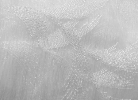 Texture, background, pattern. Tulle is white. Vintage tulle chiffon texture background. The concept of a wedding. White chiffon background texture. Beautiful white tulleの写真素材