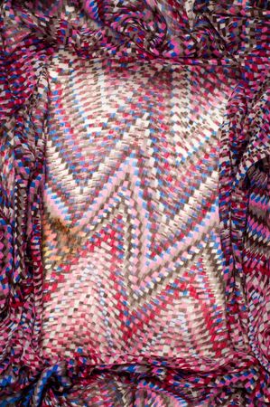 Texture, background, pattern. A woolen woolen card of Missoni color. White, red, brown, black....