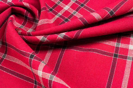texture, pattern. Scottish tartan pattern. Red and black wool plaid print as background. Symmetric...