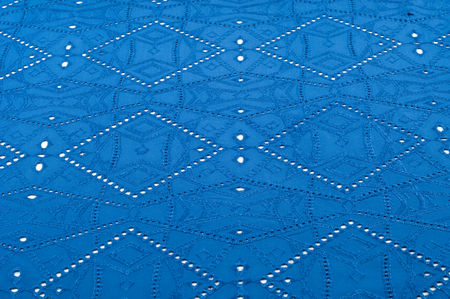 texture pattern. Cloth blue dense with perforated holes. For the avant-garde or not very serious...
