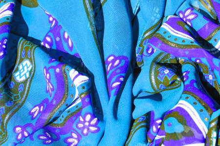 Background texture Blue silk fabric with a pattern. this light silk braided can be turned into your...