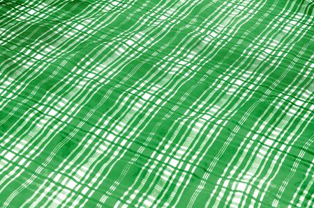 background texture. silk fabric checkered green white. beautiful silk taffeta-twill with wicker check in the "eternal bell" of green and orchid.の写真素材