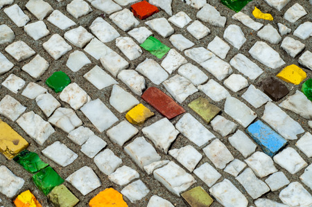Texture, background, pattern. Closeup photo of multi-colored mosaic stones. Structure design decor. Swimming pool wall and floor finishingの写真素材
