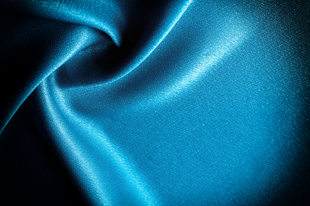 Texture, background. template. Silk fabric blue, Blue silk drapery and upholstery fabric from the courtyard - Dark curtains - Solid fabrics for backs and pillowsの写真素材