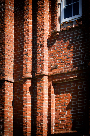 Texture, background, pattern, old wall of brickwork. red brick wall texture grunge background with vignetted corners, may use to interior designの写真素材