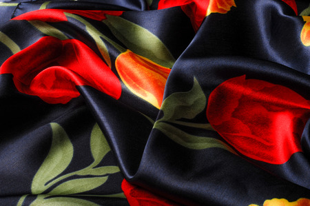 Texture, background, pattern. Silk fabric blue with tulips, yellow and red flowers. Cool Blue Watercolor Tulips Silky Vintage Fabric Yardageの写真素材