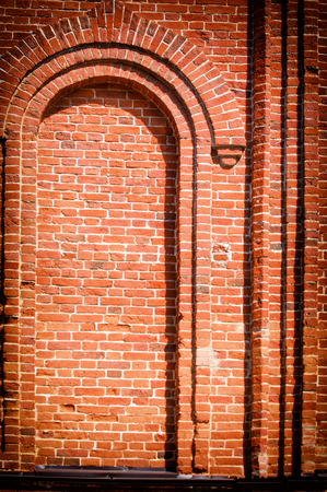 Texture, background, pattern, old wall of brickwork. red brick wall texture grunge background with vignetted corners, may use to interior designの写真素材