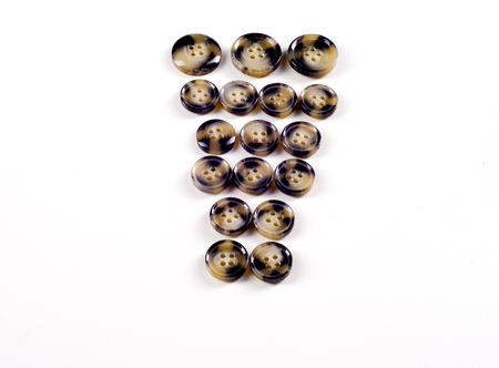 Texture, background, pattern. Buttons for clothes. This is a collection of vintage plastic buttons.....