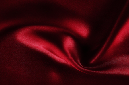 texture, pattern. cloth red silk. Look at the red and roast. Made with luxurious silk, you have to feel the glitter of the ball!の写真素材