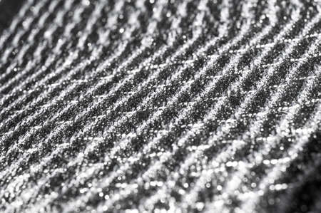 Texture, background, pattern. Women's scarf, striped fabric Black white lines intertwinedの写真素材