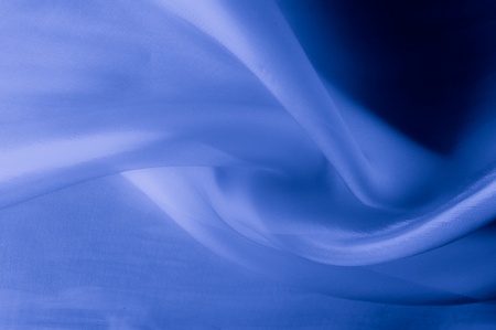 Texture, background, pattern. Pale blue clear silk cloth. SKY BLUE, also known as  BABY BLUE, POWDER BLUEの写真素材