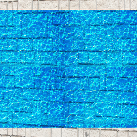Texture, background, pattern. Pool hotel with sunny reflections. Background of a rippled picture of...