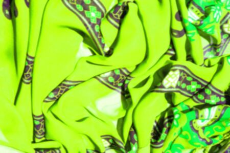 Background texture Green silk fabric with pattern. For a picture that is hard to forget, do not miss this Kelly Green and salad drawing Slim and light, it flows and moves to the waterfall.の写真素材