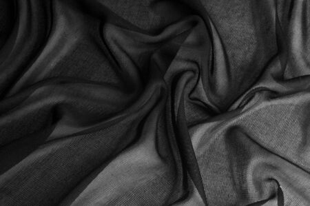 Texture, background, pattern. Black transparent fabric. Black Mesh Fabric See Through Sheer Stretchy Goth Punk Scene Emo Trendy Sexy Fashion Transparent Cover Up Four way stretchの写真素材
