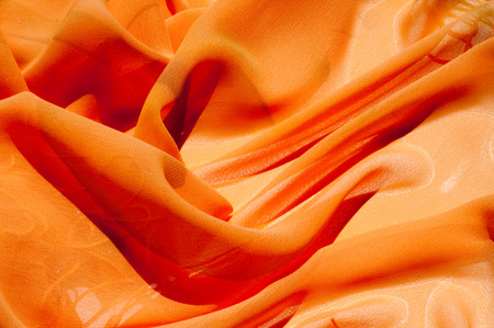 Background texture pattern. Silk crepe of chiffon peach peachpuff Introducing the sultry and stunning  Silk Satin you see here. Duchess satin is a gorgeous high-fiber count medium-bodied low lusterの写真素材