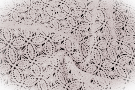 Image texture background, decorative lace with pattern. White texture of lace fabric. Template for a wedding, invitation or greeting card with a white lace frame. Wedding lace texture close-upの写真素材