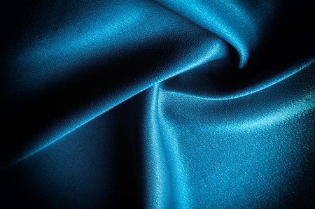 Texture, background. template. Silk fabric blue, Blue silk drapery and upholstery fabric from the courtyard - Dark curtains - Solid fabrics for backs and pillowsの写真素材