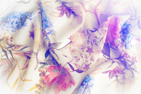 Texture, background, pattern. Silk fabric. Texture with pink and yellow flowers in watercolor technique. Wallpapers with roses, daisies and mimosa. Greeting card. Silk scarf, shawl. Holidays.の写真素材