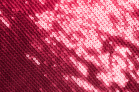 Background texture, pattern. Cloth red maroon with paillettes. Look at these Neon Pink Paillette Sequins. Round neon pink paillette sequins overlap with an iridescent sheen across a sheer purple meshの写真素材