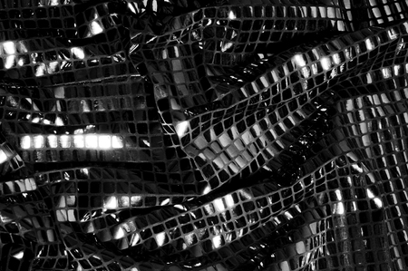 texture, background, pattern. Fabric with large paillettes of gray black. Like a binding paint mixed...