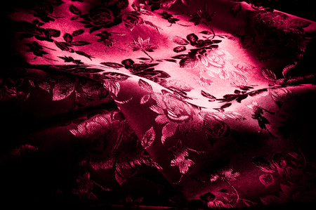 fabric, background texture. silk red fabric with a pattern of flowers. Add an exotic flash to your look with this Persian red abstract printed font SIlk Charmeuse.の写真素材