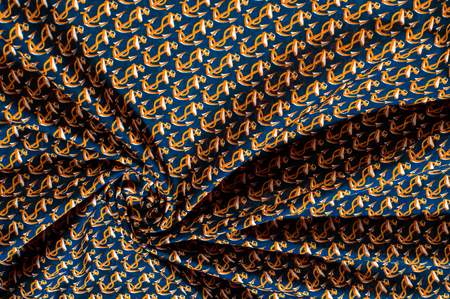 Background texture. Drawing. Cloth with a picture on the theme of the sea. Remove this blue and white anchor with the printed cotton chambraye before it leaves!の写真素材