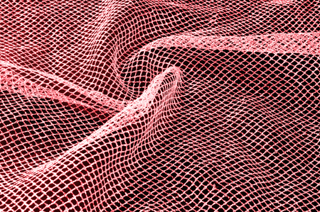 red silver mesh fabric, with a woven metallic thread Celebrate sports aesthetics with this silver red novelty With a similar body and weight it falls on some volume adding geometric texture and designの写真素材