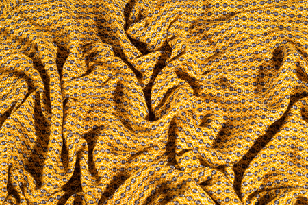 Fabric cotton is brown with a pattern of circles. Smooth and chic but still on the wild side, do not miss this Python Printed Stretch Cotton Sateen With a smooth crisp hand this cotton shows diamondsの写真素材